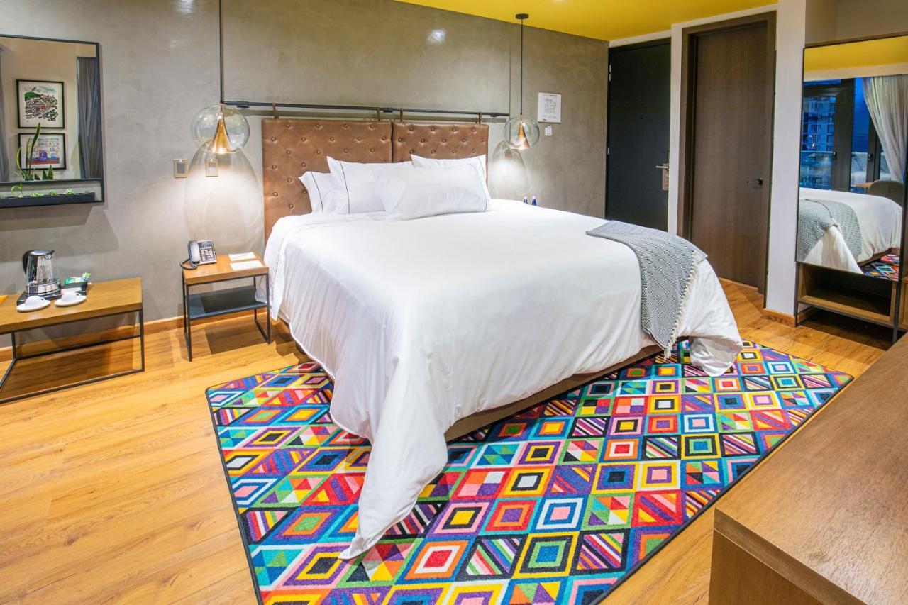 Hotel V1501 Pasto Dış mekan fotoğraf A carpet in a bedroom