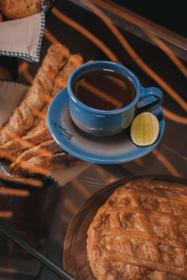 Hotel V1501 Pasto Dış mekan fotoğraf A cup of coffee with a slice of lime